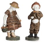 A PAIR OF ROUGE AND WHITE MARBLE STATUES Children in Dutch dress. (90cm)