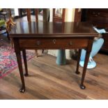 A GEORGIAN CUBAN MAHOGANY TEA TABLE With fold over top above single drawer, on turned legs. (81cm