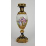 A 19TH CENTURY FRENCH SEVRES PORCELAIN AND ORMOLU VASE Hand painted figural decoration of a courting