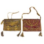 TWO 19TH CENTURY OTTOMAN VELVET AND GILT FLORAL EMBROIDERED BAGS Hung with tassels. (27.5cm x 18.
