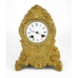 A FRENCH 19TH CENTURY GILT BRASS MANTLE CLOCK, having a rococo form case with shell motifs