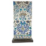 TWO 17TH CENTURY SYRIAN TILES DECORATED WITH A VASE OF FLOWERS Various shades of blue and green,