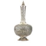 A LATE 19TH/EARLY 20TH CENTURY CHINESE/TIBETAN WHITE METAL BOTTLE FORM VASE AND COVER Embossed