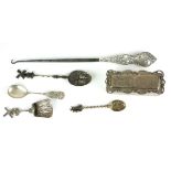 A COLLECTION OF EARLY 20TH CENTURY SILVER TRINKETS Comprising a glass trinket box with scrolled