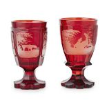 A PAIR OF 19TH CENTURY BOHEMIAN RUBY GLASS GOBLETS The faceted overlaid ruby glass finely engraved