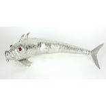 A LARGE SPANISH SILVER ARTICULATED FISH Having cabochon cut paste set eyes and hallmarked with the