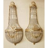 A PAIR OF FRENCH EMPIRE STYLE BRASS AND CUT GLASS BASKET WALL SCONCES. (74cm)