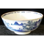 A 19TH CENTURY ORIENTAL BLUE AND WHITE PORCELAIN PUNCH BOWL Hand painted with broad pattern rim,