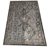 A LARGE TURKISH OTTOMAN WALL HANGING Finely woven with script, florets and foliage, contained in a