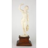 A FINE LATE 19TH CENTURY CENTRAL EUROPEAN IVORY CARVING Female nude in standing position, holding in