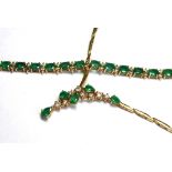 AN 18CT GOLD, DIAMOND AND EMERALD NECKLACE AND MATCHING BRACELET The necklace set with pear cut