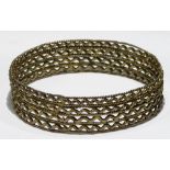 A VINTAGE YELLOW METAL WIREWORK BANGLE Consecutive geometric form pierced bands. (approx diameter