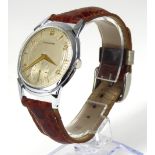 MOVADO, JUMBO, A VINTAGE STAINLESS STELL GENT'S WRISTWATCH Having a silver tone circular dial with