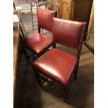 A SET OF FOUR EARLY 20TH CENTURY CROMWELLIAN STYLE DINING CHAIRS Red leather upholstery.