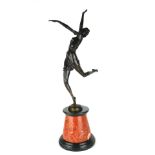 AFTER BRUNO ZACH, A LARGE ART DECO STYE BRONZE STATUE OF A DANCER On a rouge marble base. (h 65cm)