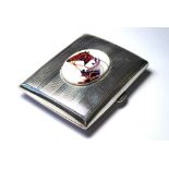 AN EARLY 20TH CENTURY SILVER AND MODERN EQUESTRIAN ENAMEL CIGARETTE CASE Rectangular form,