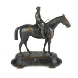 AFTER JOULES MOGNIEZ, 1835 - 1895, A BRONZE HORSE AND JOCKEY SCULPTURE Seated pose, signed to