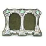 A STERLING SILVER AND ENAMEL ART NOUVEAU DESIGN DOUBLE PHOTOGRAPH FRAME Organic form with green