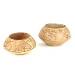 TWO ROMAN TERRACOTTA BOWLS Circular form with sloping sides and painted organic form decoration. (