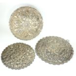 A SELECTION OF THREE VARIOUS OTTOMAN SILVER ORNAMENTAL MIRRORS The border embossed with flowerheads,