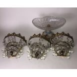 A SET OF THREE GILT METAL AND CRYSTAL WALL SCONCES Along with a glass and porcelain centre bowl. (