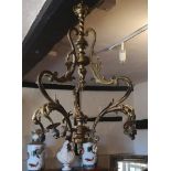 A LARGE LATE 19TH/EARLY 20TH CENTURY GILT BRONZE CHANDELIER Three branch arms with Rococo form