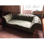 A VICTORIAN DROP END CHESTERFIELD SOFA In green button back fabric upholstery, raised on turned