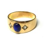 AN EARLY 20TH CENTURY CONTINENTAL YELLOW METAL, SAPPHIRE AND DIAMOND SIGNET RING The cabochon cut