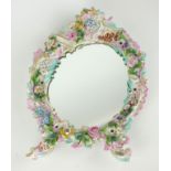 AN EARLY 20TH CENTURY POTS CHAPPEL DRESDEN PORCELAIN EASEL MIRROR Scrolled and pierced frame with