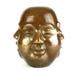 A CHINESE FOUR FACE BUDDHA Bearing character mark. (h 20cm)