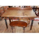 A VICTORIAN MAHOGANY CLARKS DESK The slope top above two drawers, raised on turn legs. (128cm x 74cm