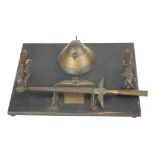 A FIRST WORLD WAR BRASS TRENTCH ART DESK STAND Having twin handles, gun shell inkwell and letter