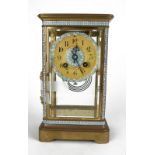 A FRENCH GILT BRASS AND CHAMPLEVE REGULATOR MANTEL CLOCK Four bevelled glass panels with blue and