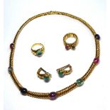 AN 18CT GOLD AND PASTE SET JEWELLERY SUITE Comprising a necklace rope twist design with cabochon cut