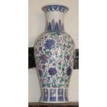 HARRODS, A LARGE PAIR OF CHINESE PORCELAIN FLOOR BALUSTER VASES With blue and green floral