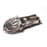 A NOVELTY STERLING SILVER EQUESTRIAN VESTA CASE Cast as a horse hoof with strike to base.