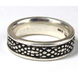GEORG JENSEN, A VINTAGE DANISH SILVER BAND RING Having stylized textured finish, marked to