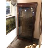 A LATE VICTORIAN OAK WALL MOUNTING SHOP'S DISPLAY CABINET The single glazed door enclosing glass