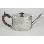 A GEORGIAN SILVER OVAL TEAPOT With diamond pattern engraving and family crest, hallmarked John