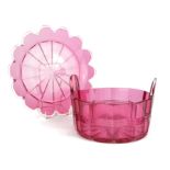 A LARGE RUBY GLASS BASKET AND CHARGER/PLATE Twin handled faceted circular form with star cuts to