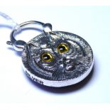 A NOVELTY SILVER CAT FORM PADLOCK Set with glass eyes. (approx 4cm)
