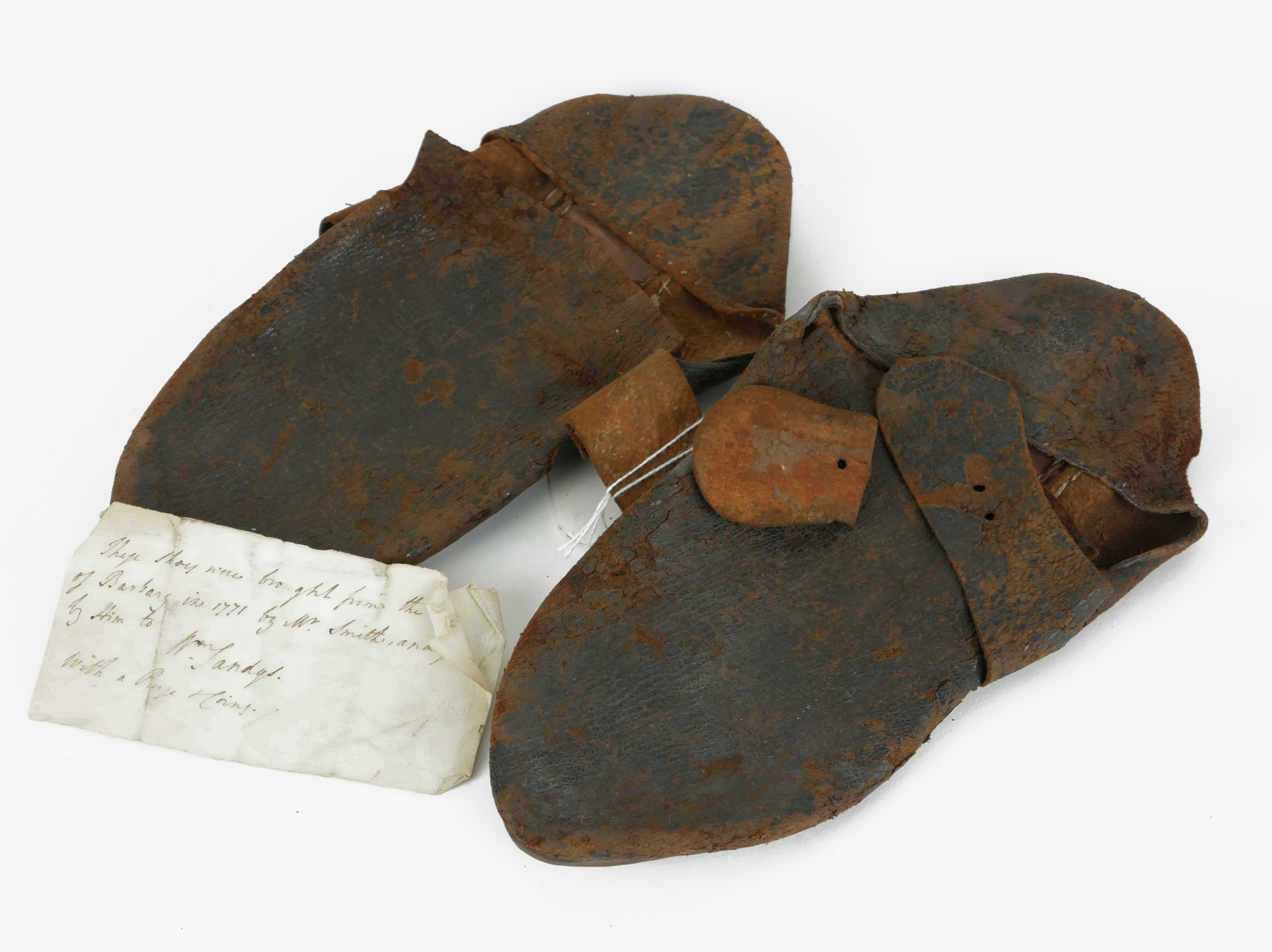 A PAIR OF 18TH CENTURY LEATHER GENTS SHOES Plain form with accompanying hand written letter These