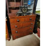 A VICTORIAN MAHOGANY CHEST With two short above three long drawers.