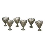 A SET OF SIX PERSIAN DESIGN SILVER FILIGREE CUPS Each having open work delicate pierced