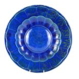 A PERSIAN BLUE GLAZE AND SILVER LUSTRE CHARGER PLATE Lobed form with silver lustre decoration.