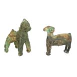 TWO ARCHAIC ASIAN BRONZE ANIMAL MODELS Imperial horse in standing pose and bronze model of a ram. (