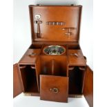 WITHDRAWN A BRASS BOUND LEATHER PICNIC HAMPER With fitted interior. (45cm x 34cm x 36cm)