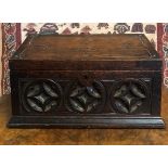 A 19TH CENTURY OAK GOTHIC REVIVA TABLE TOP CASKET With part fitted interior. (27.5cm x 16.5cm x 16.