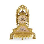 A 19TH CENTURY FRENCH GILT BRONZE MANTLE CLOCK Elaborately cased and inset with pink and gilt