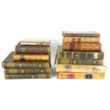 A MISCELLANEOUS SELECTION OF ANTIQUE AND LATER LEATHER BOUND BOOKS To include 'Captain Cook's